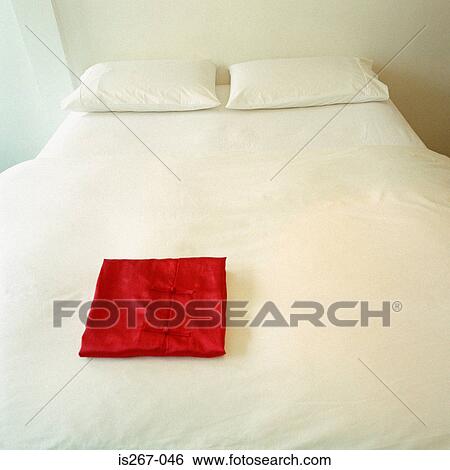 Red pajamas on bed View Large Photo Image Stock Photograph - Red pajamas on bed. Fotosearch