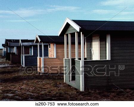 Row of beach huts View Large Photo Image Stock Image - Row of beach huts. Fotosearch
