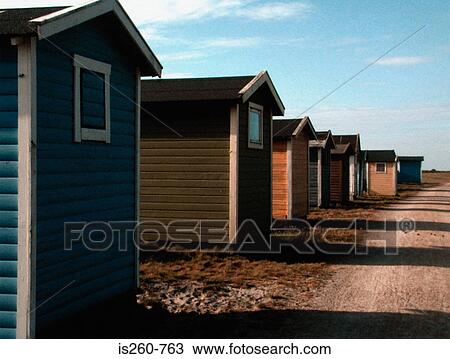 Row of beach huts View Large Photo Image Stock Image - Row of beach huts. Fotosearch