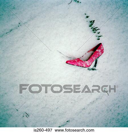 Snow covered pink shoe View Large Photo Image Stock Photo - Snow covered pink shoe. Fotosearch