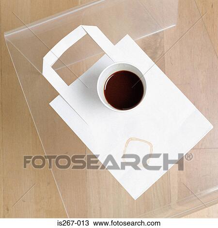 Square coffee stain on paper bag View Large Photo Image Stock Image - Square coffee stain on paper bag. Fotosearch