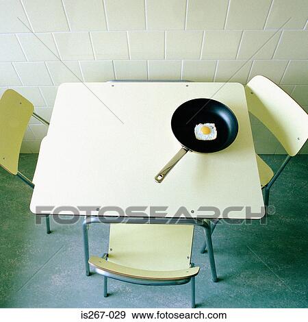 Square fried egg on table View Large Photo Image Stock Photo - Square fried egg on table. Fotosearch