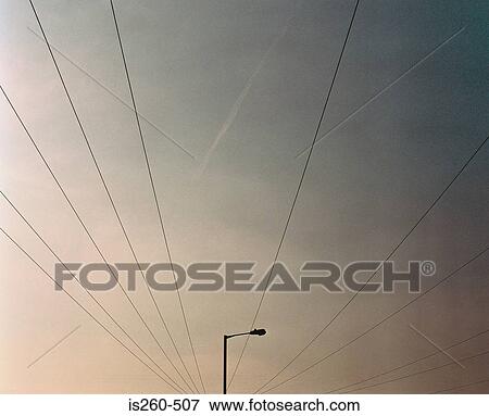 Street light and power line View Large Photo Image Stock Photo - Street light and power line. Fotosearch