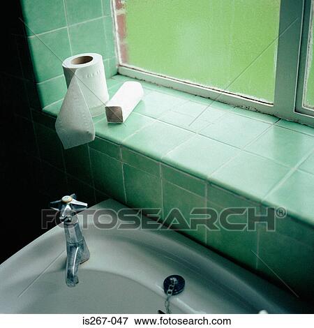 Toilet rolls on windowsill View Large Photo Image Stock Photo - Toilet rolls on windowsill. Fotosearch