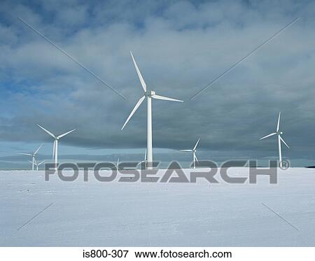 Wind turbines in the snow View Large Photo Image Stock Photo - Wind turbines in the snow. Fotosearch