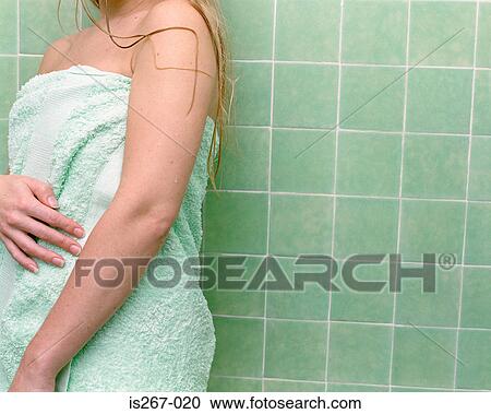 Woman standing in shower View Large Photo Image Stock Image - Woman standing in shower. Fotosearch