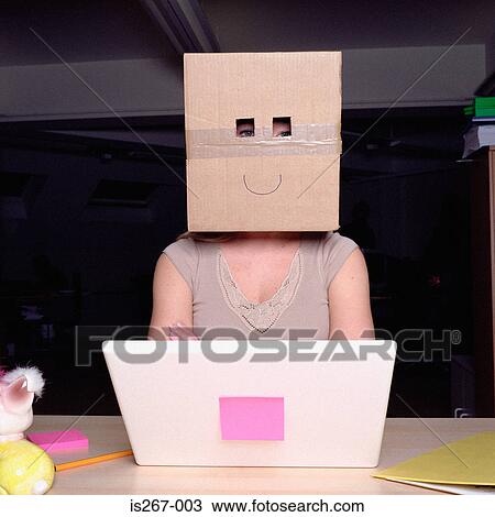 Woman wearing a cardboard box View Large Photo Image Stock Image - Woman wearing a cardboard box. Fotosearch