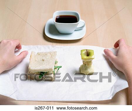 Woman with square lunch View Large Photo Image Stock Image - Woman with square lunch. Fotosearch