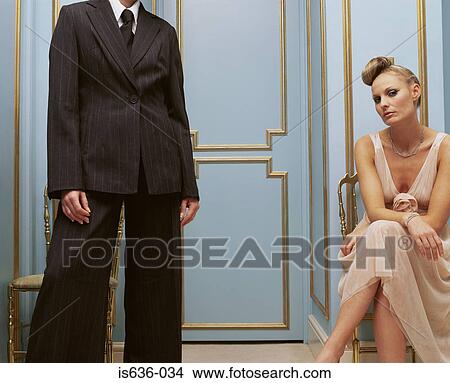 Women in masculine and feminine clothing View Large Photo Image Picture - Women in masculine and feminine clothing. Fotosearch