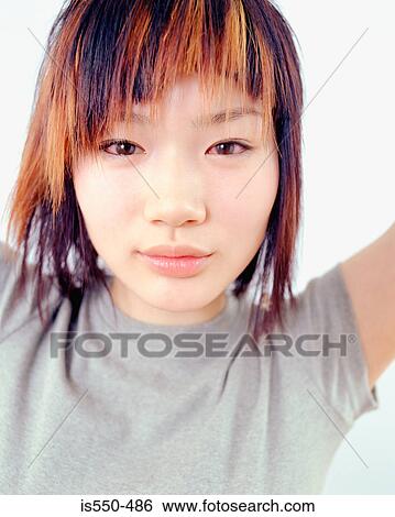 Young Oriental woman View Large Photo Image Stock Photograph - Young Oriental woman . Fotosearch