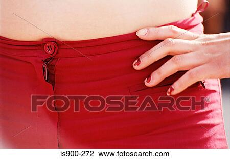 Young woman wearing red trousers View Large Photo Image Stock Image - Young woman wearing red trousers. Fotosearch