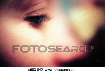Stock Image - Close-up Profile of a woman. Fotosearch