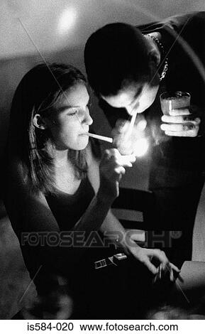 Stock Image - Couple smoking. Fotosearch