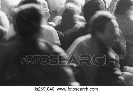Stock Image - Crowd of men seated. Fotosearch