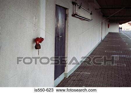 Fire hydrant and ladder on wall View Large Photo Image Stock Image - Fire hydrant and ladder on wall. Fotosearch