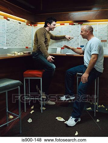 Stock Photo - Men discussing bets. Fotosearch