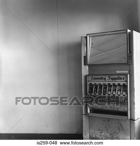 Old laundry supplies dispenser View Large Photo Image Stock Photo - Old laundry supplies dispenser. Fotosearch