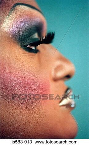 Stock Image - Profile of male transvestite. Fotosearch