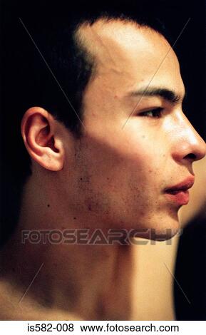 Stock Photo - Profile of young man. Fotosearch