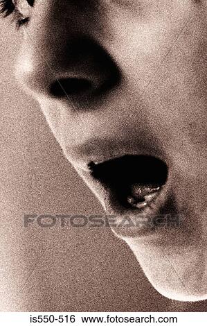 Woman yawning View Large Photo Image Stock Photograph - Woman yawning. Fotosearch