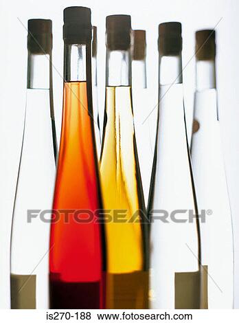 Bottles of liquid View Large Photo Image Stock Photo - Bottles of liquid. Fotosearch