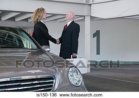 Stock Photograph - Business people shaking hands. Fotosearch