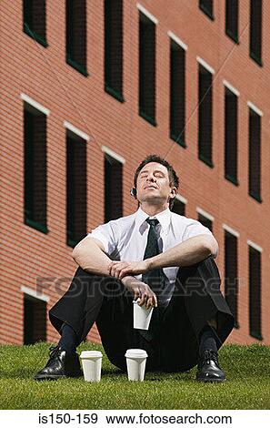 Stock Photo - Businessman taking a break. Fotosearch