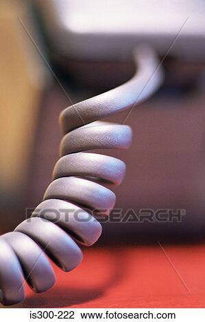 Stock Image - Close up of telephone cord. Fotosearch
