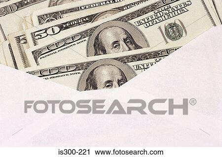 Dollar bills in an envelope View Large Photo Image Stock Image - Dollar bills in an envelope. Fotosearch