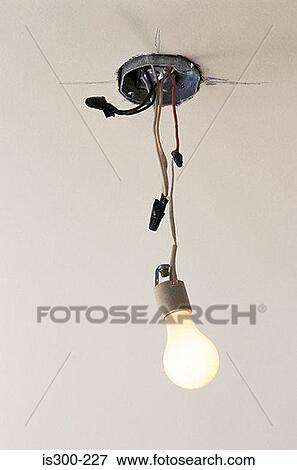 Electric light and dangling wires View Large Photo Image Stock Photo - Electric light and dangling wires. Fotosearch