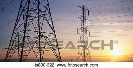 Electricity pylons at sunrise View Large Photo Image Stock Image - Electricity pylons at sunrise. Fotosearch