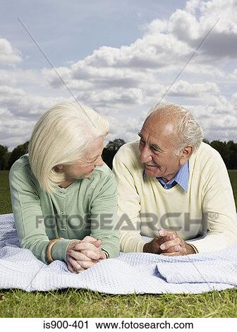 Senior couple in the park View Large Photo Image Stock Image - Senior couple in the park. Fotosearch