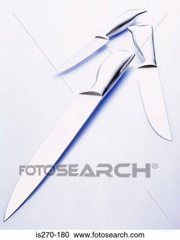 Stock Image - Three kitchen knives. Fotosearch