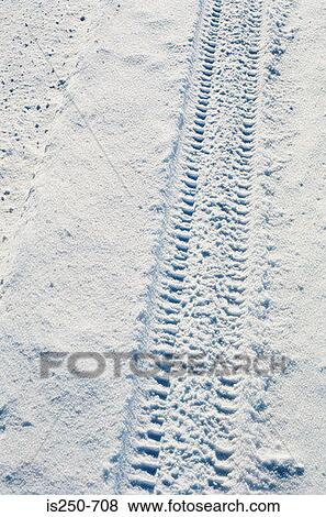 Tyre track in the snow View Large Photo Image Stock Photo - Tyre track in the snow. Fotosearch