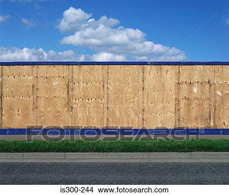 Wall around a construction site View Large Photo Image Picture - Wall around a construction site. Fotosearch