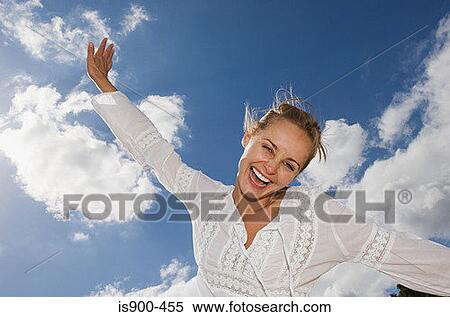 Exhilarated woman View Large Photo Image Stock Photography - Exhilarated woman. Fotosearch