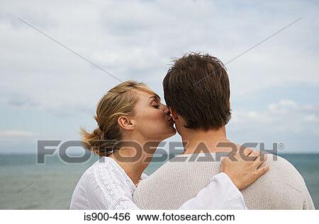 Romantic couple by the sea View Large Photo Image Stock Photograph - Romantic couple by the sea. Fotosearch