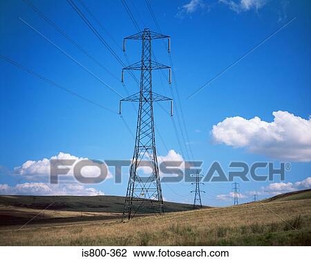 Electrical towers in field View Large Photo Image Stock Image - Electrical towers in field. Fotosearch