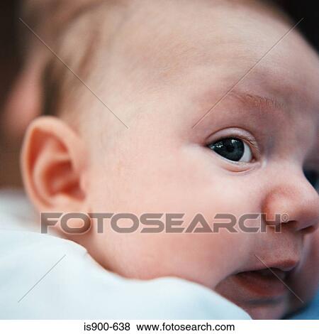 Stock Photo - Face of newborn baby. Fotosearch