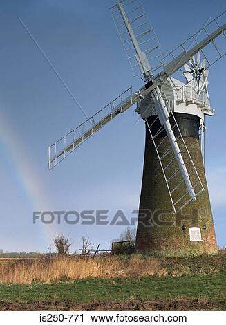 Rainbow by windmill View Large Photo Image Stock Image - Rainbow by windmill. Fotosearch