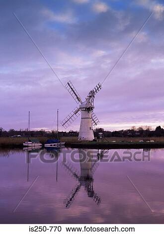 Windmill reflected in lake View Large Photo Image Stock Image - Windmill reflected in lake . Fotosearch