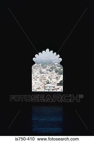 Cityscape seen through arched window View Large Photo Image Stock Image - Cityscape seen through arched window. Fotosearch