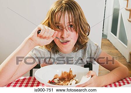 Girl eating messily View Large Photo Image Stock Image - Girl eating messily. Fotosearch