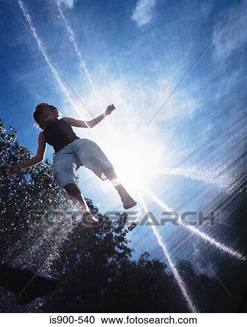 Girl jumping in sunlight View Large Photo Image Stock Image - Girl jumping in sunlight. Fotosearch