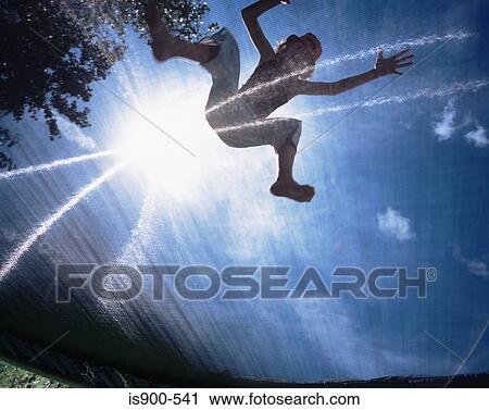 Stock Image - Girl jumping. Fotosearch