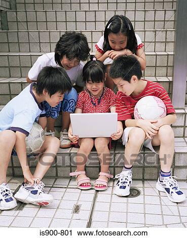 Group of children with laptop computer View Large Photo Image Stock Image - Group of children with laptop computer. Fotosearch