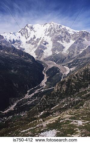 Stock Image - Snowcapped mountains. Fotosearch