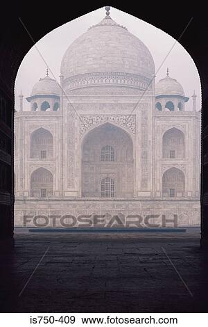 Stock Photo - Taj Mahal seen through arch. Fotosearch