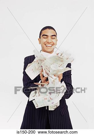 Stock Image - Businessman with lots of money. Fotosearch