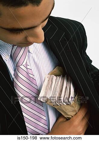 Businessman with wad of cash View Large Photo Image Stock Photo - Businessman with wad of cash. Fotosearch